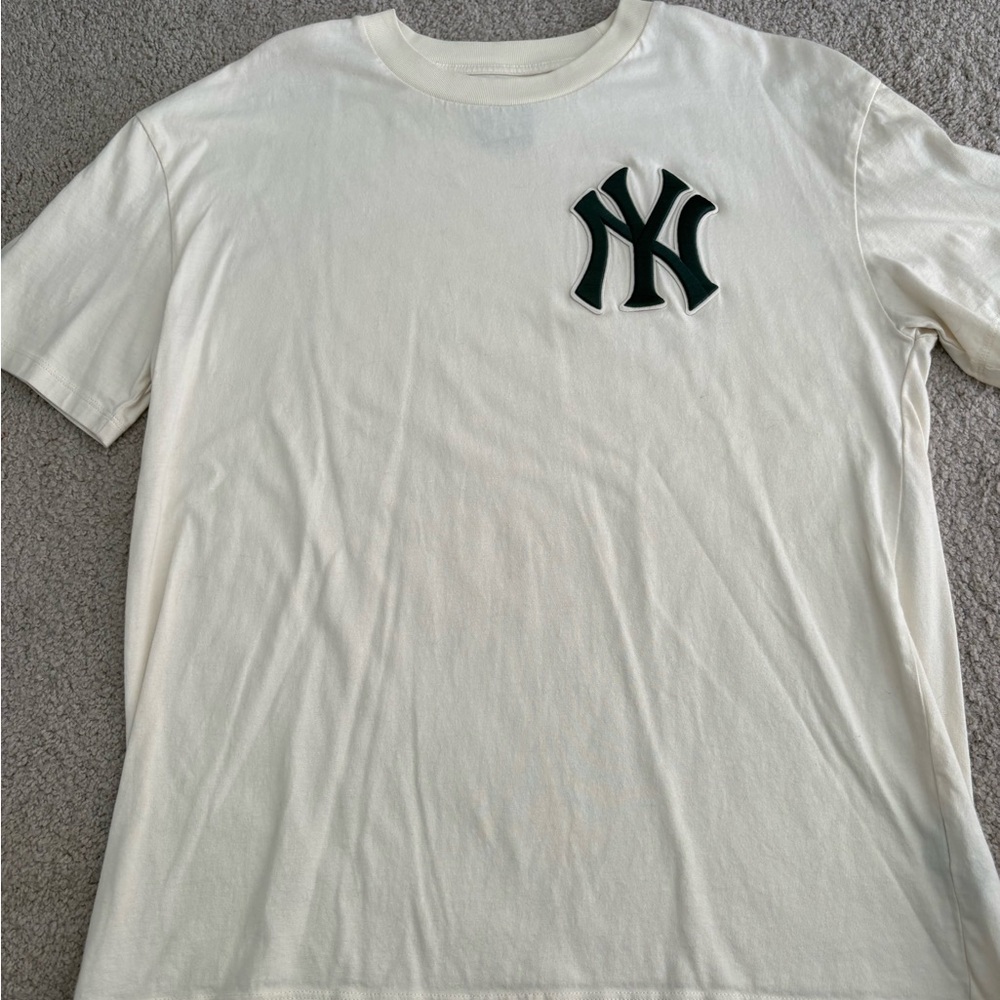 Classic Cream Tee with Black Emblem